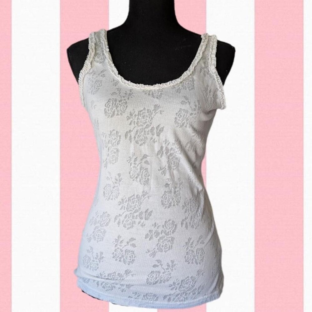 White floral lace tank top with ruffled trim on collar